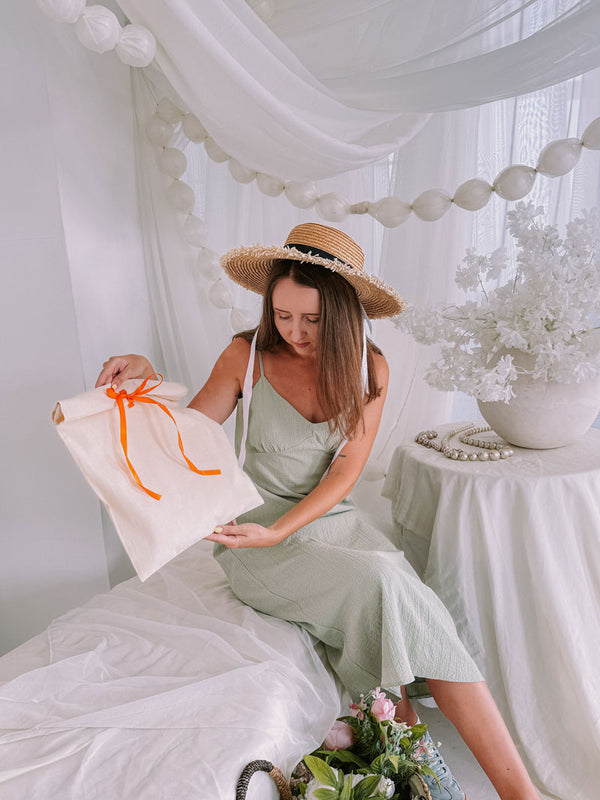 Beige Cotton Drawstring Pouch with Orange Ribbon – Reusable Gift and Storage Bag